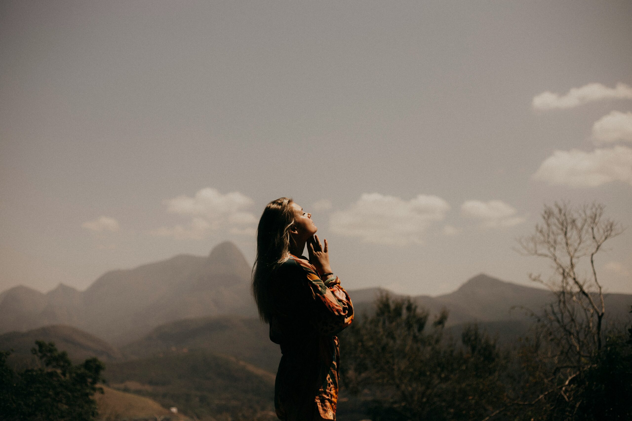 Women on top of mountain | Anxiety