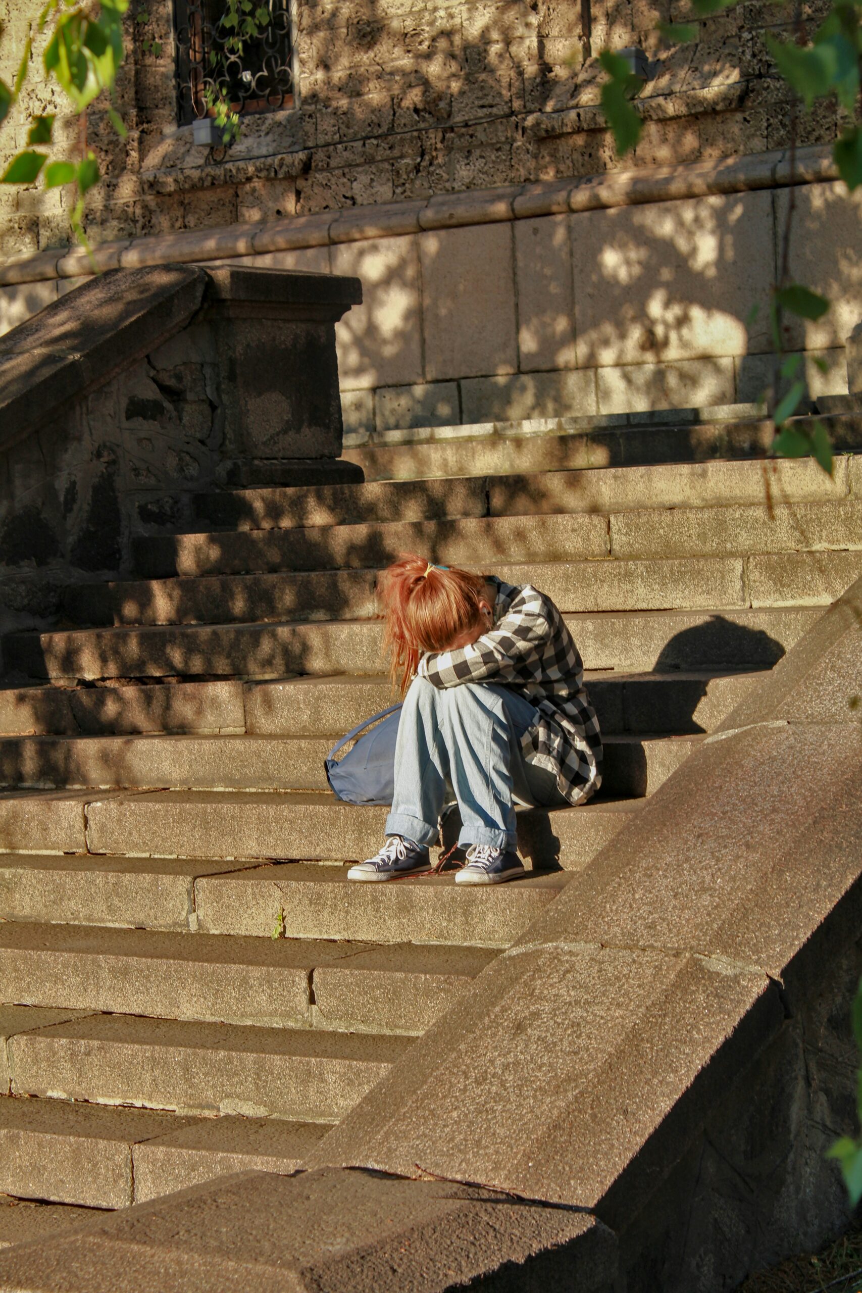 Girl sitting on steps | overthink | overthinking